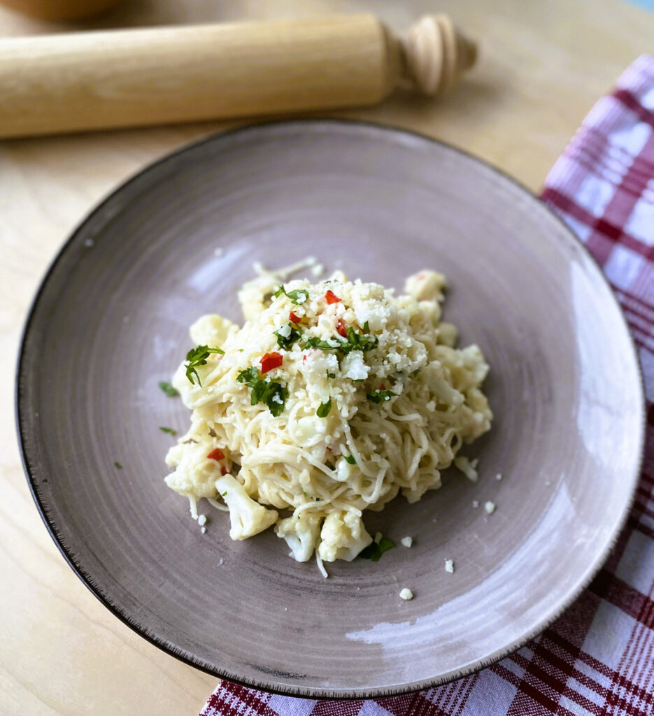 Spaghetti Blumenkop-Parmesan-Sugo
